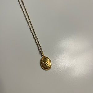 Mejuri Gold Vermeil Strength Tarot Card Necklace.